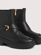 COCCINELLE BOTAS PRETAS COM FIVELA DOURADA