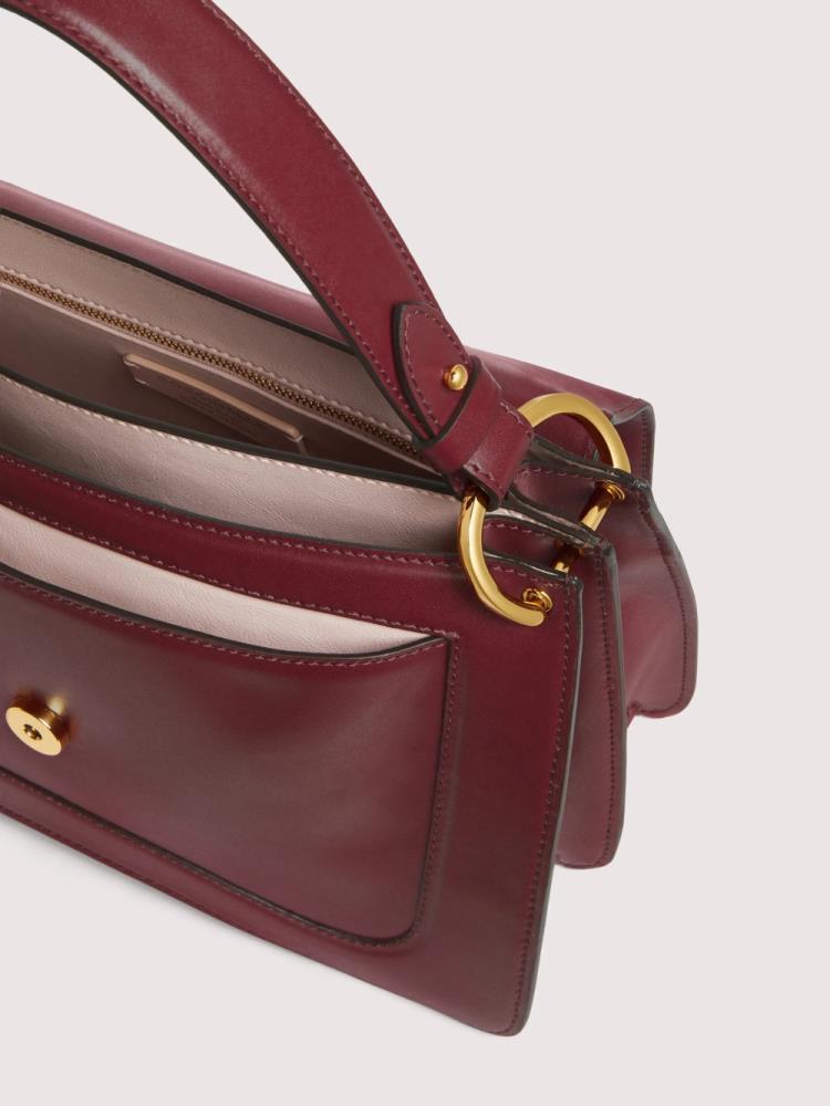 COCCIONELLE CARTEIRA DE MÃO